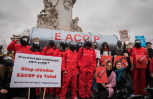 Activists protest against the financing Eacop project in Africa in Paris, France on February 22, 2023. PHOTO | AFP