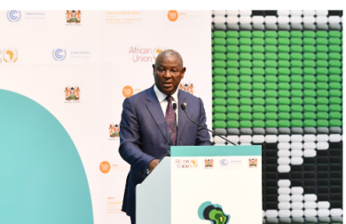 Equity Group Managing Director and CEO Dr. James Mwangi presents the private sector statement of commitment to combating climate change on behalf of the private sector during the closing of the 2023 Africa Climate Summit