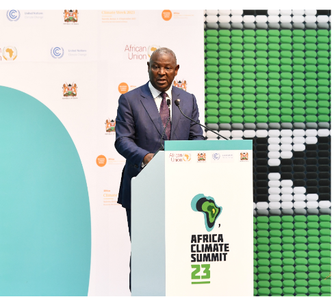 image Equity Group Managing Director and CEO Dr. James Mwangi presents the private sector statement of commitment to combating climate change on behalf of the private sector during the closing of the 2023 Africa Climate Summit